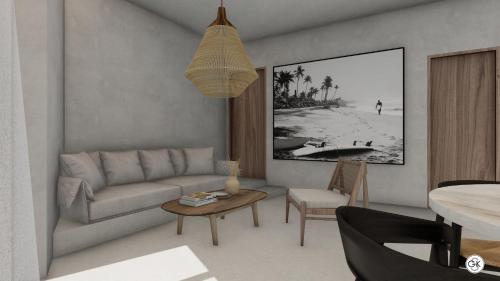 a living room with a couch and a table at Kalimera Karpathos Luxury Villas in Afiartis