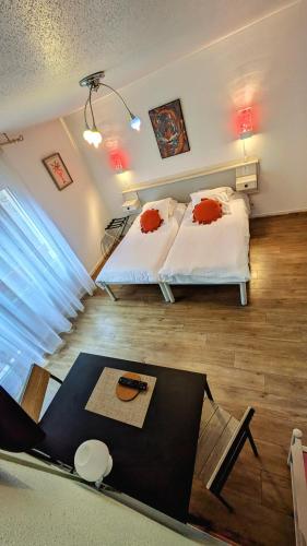 Una cama o camas en una habitación de Residence Des Sources