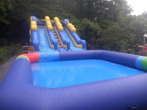 a inflatable water slide in a park at Ganghwado Baba Valley Pension in Incheon