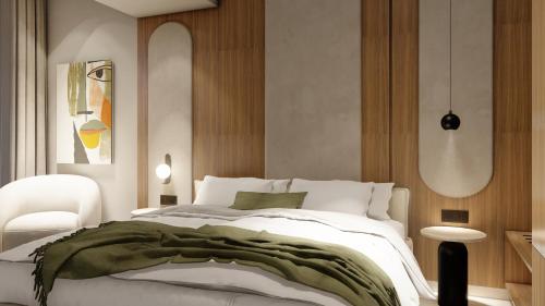 Alizo Comfort Chic Stay Rhodes - Adults Only tesisinde bir odada yatak veya yataklar