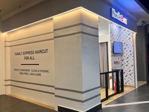 a store front with a wall with a sign on it at SS15 Courtyard Subang Jaya Sunway Home Cinema Projector Studio 120 Inches in Subang Jaya