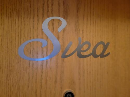 a sign on a wooden wall with the word saeco at FeWo Köt- 3 Ferienwohnungen im historischen Köthener Stadtkern in Köthen