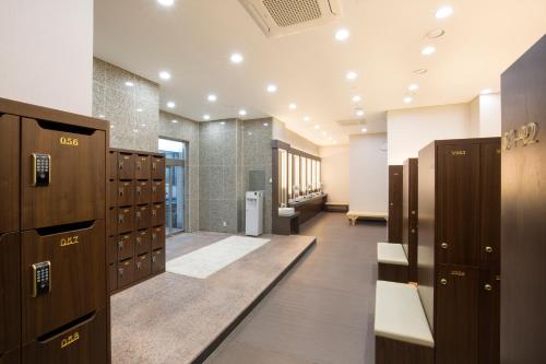a row of lockers in a locker room at Benikea Hotel Haeundae in Busan
