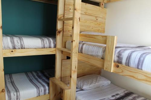 Ένα ή περισσότερα κρεβάτια σε δωμάτιο στο Urban Hive Backpackers