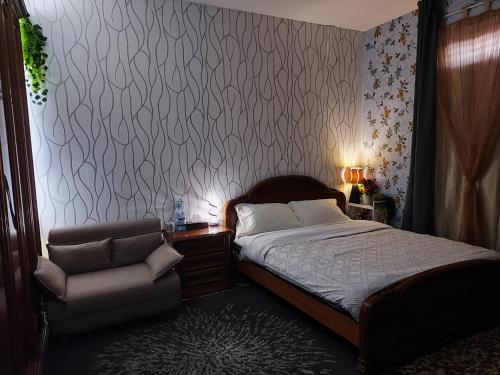 Postel nebo postele na pokoji v ubytování FARISTHA house