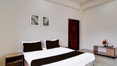 Postel nebo postele na pokoji v ubytování Autumn Inn