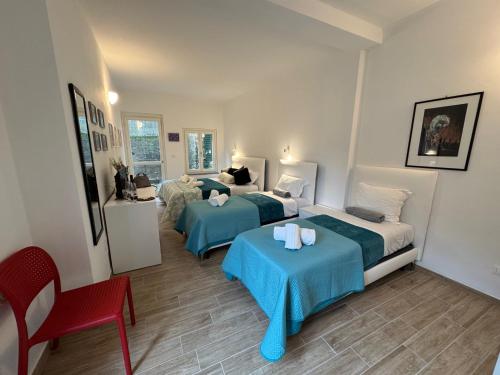 Postel nebo postele na pokoji v ubytování Albergo Tenco by Bottega