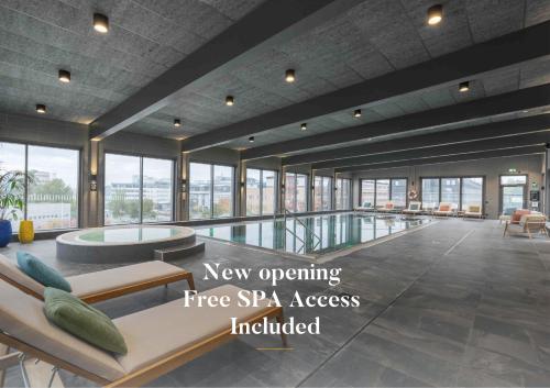 a rendering of a new operating free spa access included in a building at voco Stockholm - Kista by IHG in Stockholm