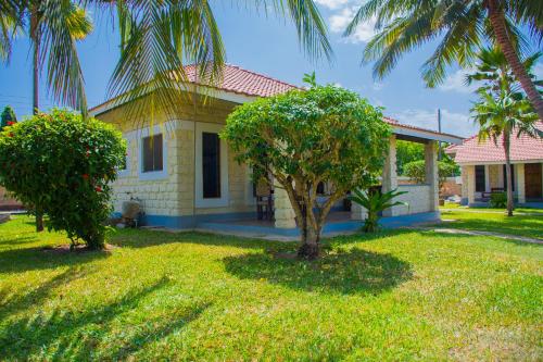 Zahrada ubytování Doric Cottages Diani