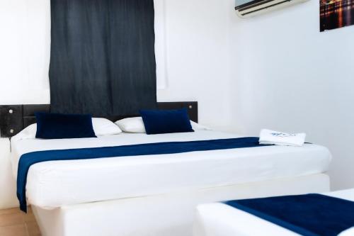 Postel nebo postele na pokoji v ubytování Hotel Urak
