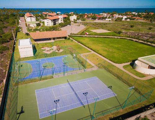 Tenis a/nebo squash v ubytování Carneiros Beach Resort nebo okolí