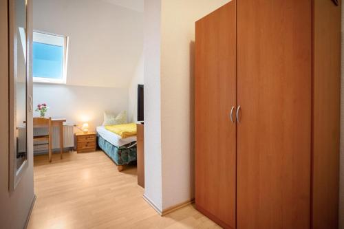 Ένα ή περισσότερα κρεβάτια σε δωμάτιο στο Herrenhaus Talevski