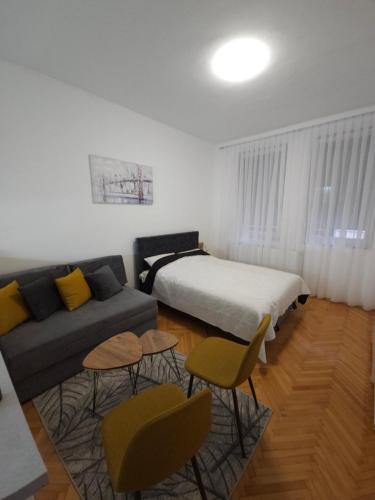 Postel nebo postele na pokoji v ubytování Stan na dan G & V