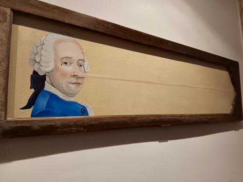 Un tableau d'un président sur un mur dans l'établissement The Appart 90m2 au coeur de la vieille ville, à La Rochelle