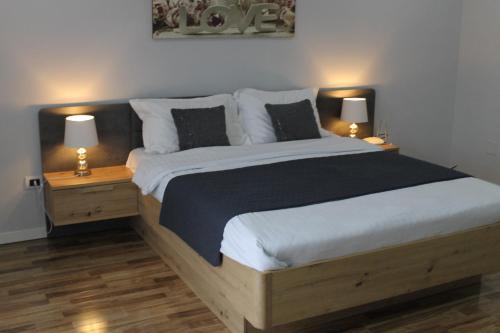 Postel nebo postele na pokoji v ubytování Allegra