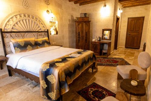 Postel nebo postele na pokoji v ubytování Midland Cave Suites