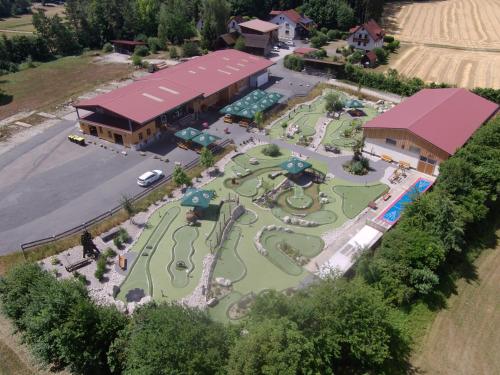 an overhead view of a golf course at a resort at Ferienhaus Brütting in Pottenstein