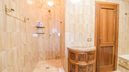 a bathroom with a toilet and a sink and a shower at VILLA PRESTIGE - with Balconies in Monsummano
