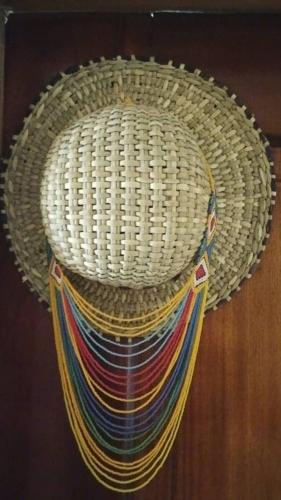 a wicker basket with a colorful scarf at Kirungi Vacation Homes - Spacious apartment with Mountain view in Fort Portal
