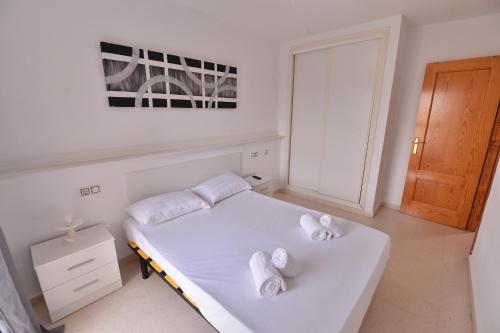 Postel nebo postele na pokoji v ubytování San Remo Apartamento 1, Benidorm Levante