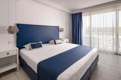 Postel nebo postele na pokoji v ubytování db Seabank Resort + Spa All Inclusive