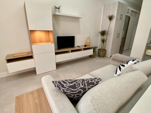 Area soggiorno di Palangreros Beach Apartment