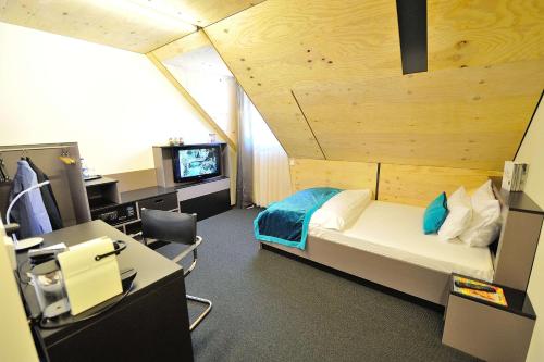 Postel nebo postele na pokoji v ubytování Best Western Plus BierKulturHotel Schwanen