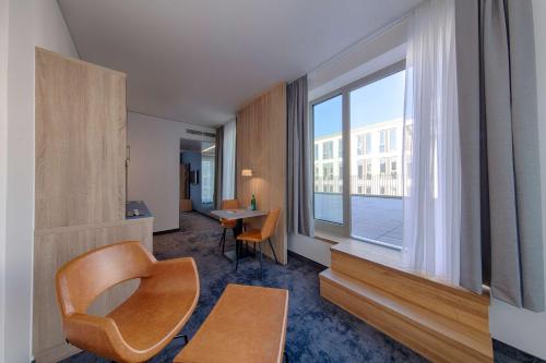 Ein Sitzbereich in der Unterkunft Best Western Hotel Wiesbaden