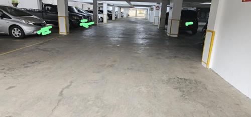 a parking garage with cars parked in it at Diamond in Kileleshwa Othaya Rd in Nairobi