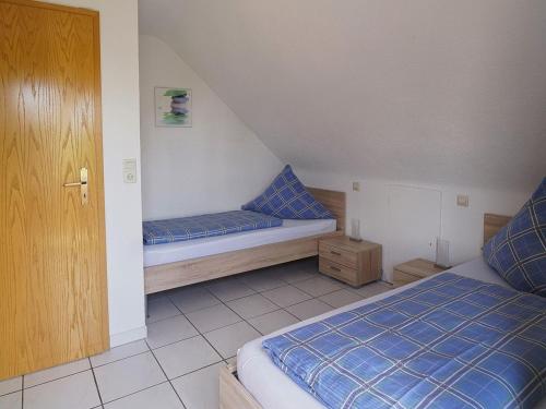Ένα ή περισσότερα κρεβάτια σε δωμάτιο στο Haus Säntisblick