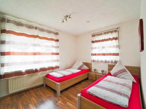 Ένα ή περισσότερα κρεβάτια σε δωμάτιο στο Haus Säntisblick