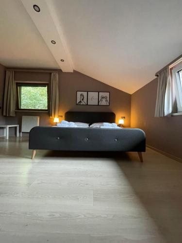 a bedroom with a large bed in a room at The Art and Sporthotel in Innsbruck
