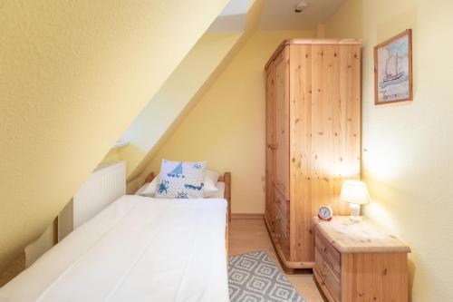 Postel nebo postele na pokoji v ubytování Südfall