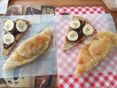 a group of slices of pizza with bananas on top at Stratos ArtDeco House in Kalavasos