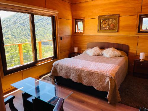 Ένα ή περισσότερα κρεβάτια σε δωμάτιο στο Caburgua Bella Vista