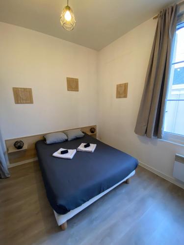 Katil atau katil-katil dalam bilik di Charmant T2 - Centre - 4 personnes