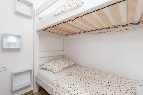 Katil atau katil-katil dalam bilik di Apartments - Villa Palmis