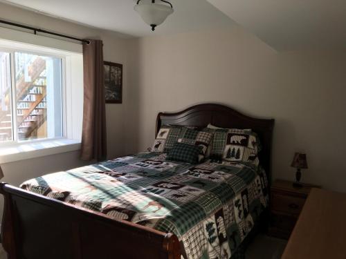 Postel nebo postele na pokoji v ubytování Simcoe B&B - Incredible vacation suite