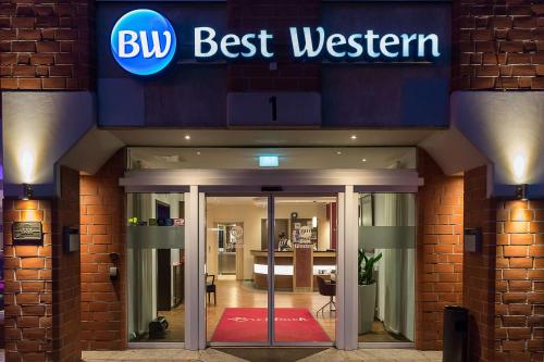 a building with a sign that reads bud best western at Best Western Hotel Breitbach in Ratingen