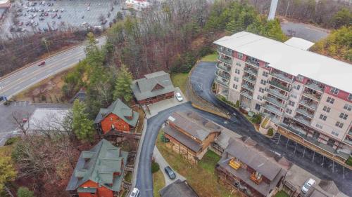 an aerial view of a building and a road at Moonlight Lodge Family Cabin in Pigeon Forge