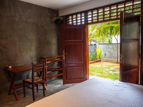 Katil atau katil-katil dalam bilik di Ceylon Stays Hiriketiya