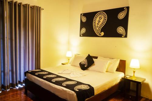 Postel nebo postele na pokoji v ubytování Deer Hill Rest Kandy
