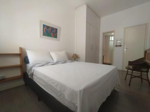 Ένα ή περισσότερα κρεβάτια σε δωμάτιο στο Apartamento Confort 804