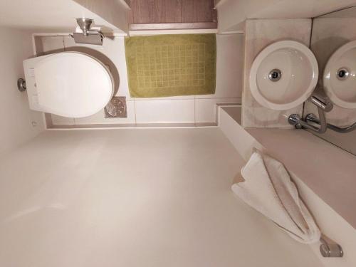 Ένα μπάνιο στο Apartamento Confort 804
