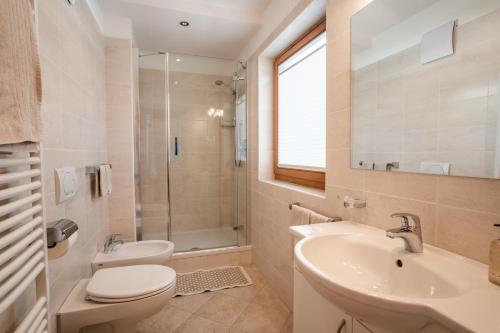 Ένα μπάνιο στο Residence Cesa Ladina