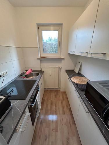Kuchyň nebo kuchyňský kout v ubytování Sehr schönes und möbliertes Apartment