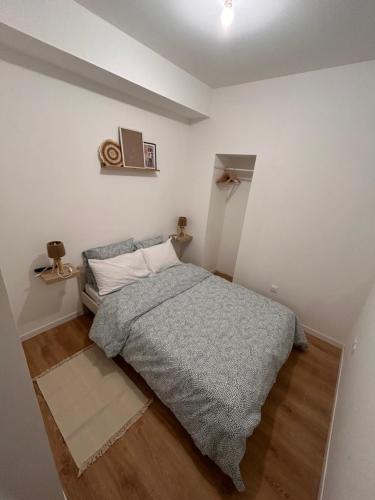 Ένα ή περισσότερα κρεβάτια σε δωμάτιο στο Serenity Stay