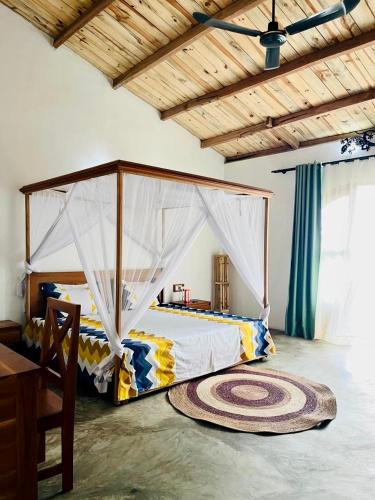 Ένα ή περισσότερα κρεβάτια σε δωμάτιο στο Appartement YLANG