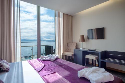 Postel nebo postele na pokoji v ubytování Atlantida Mar Hotel
