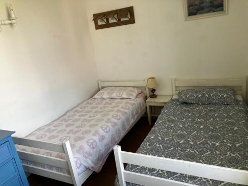 Ένα ή περισσότερα κρεβάτια σε δωμάτιο στο Gîte des Roses